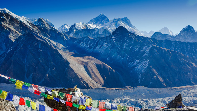 Himalayas prayer flags near mountain scape