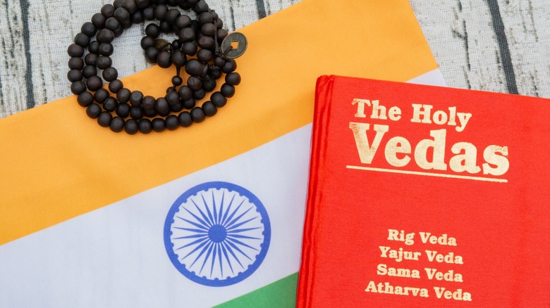 Vedas book, Indian flag, beads