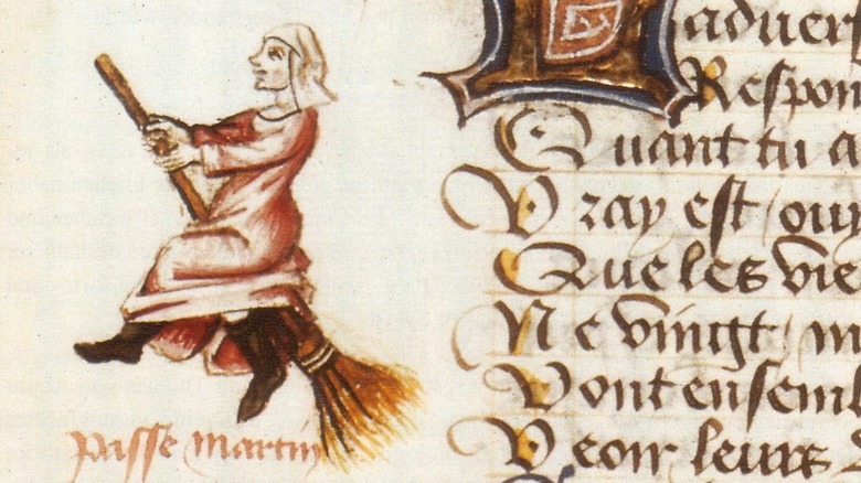Witch riding broom artwork