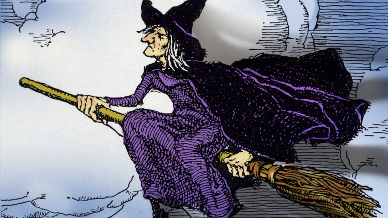 Witch riding a broom