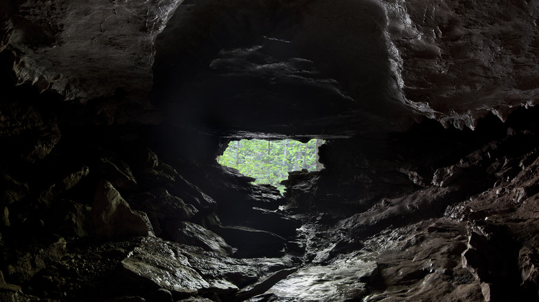 Lit cave entrance