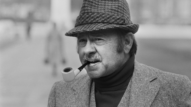 Mickey Rooney with hat and pipe