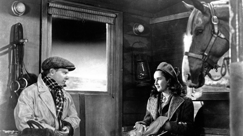 Mickey Rooney Elizabeth Taylor in horse stable in National Velvet