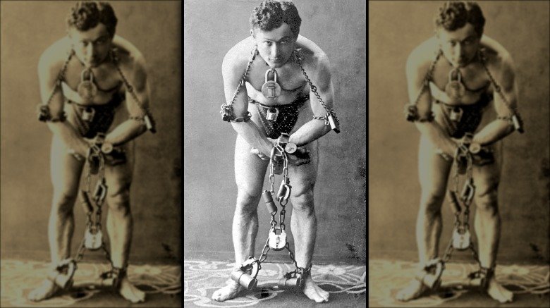 Harry Houdini in chains