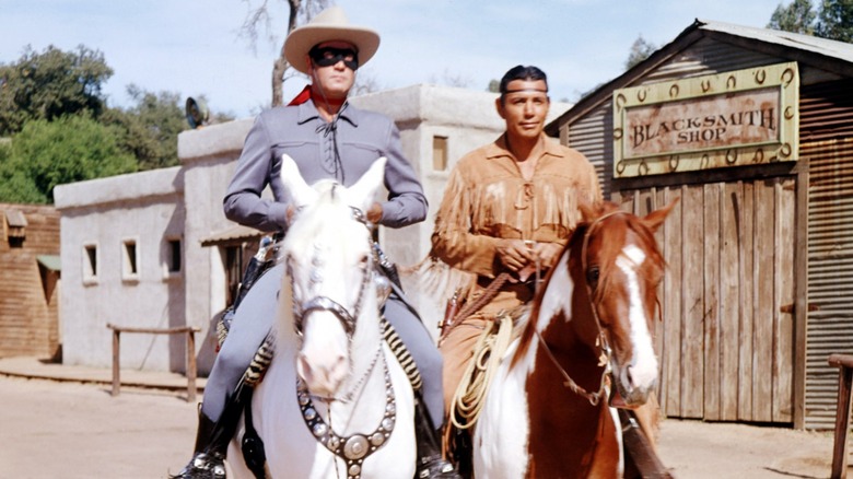 The Lone Ranger and Tonto riding horses
