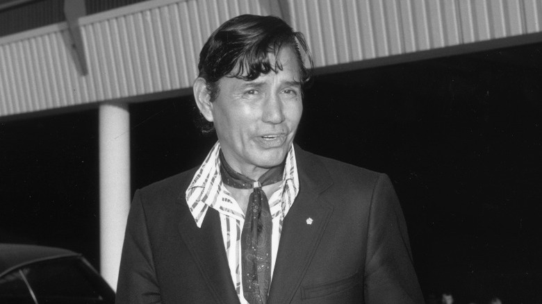 Jay Silverheels suit smiling