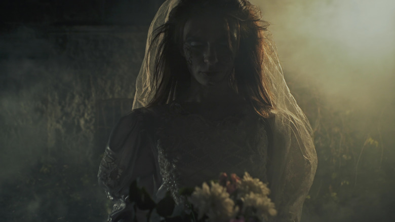 A ghostly bride with a bouquet