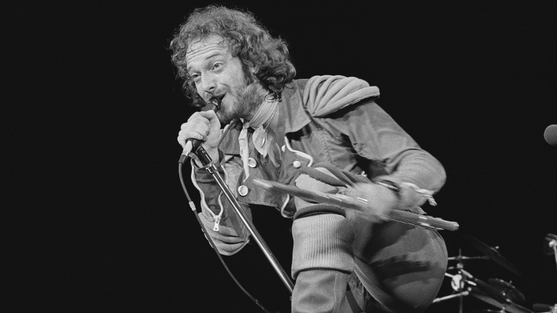 Ian Anderson of Jethro Tull singing on stage