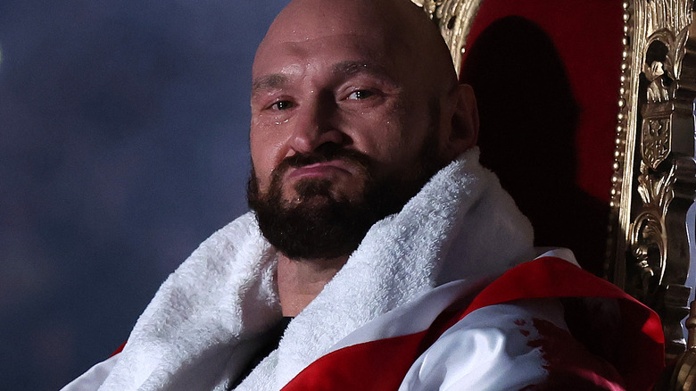 tyson fury sitting on a throne