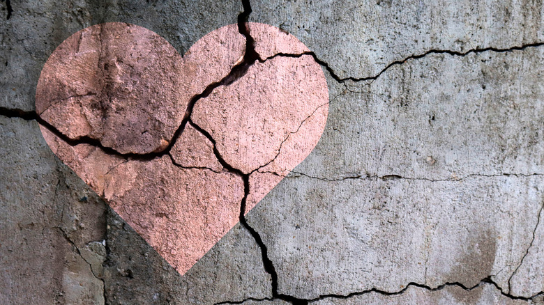 painted heart on cracked wall