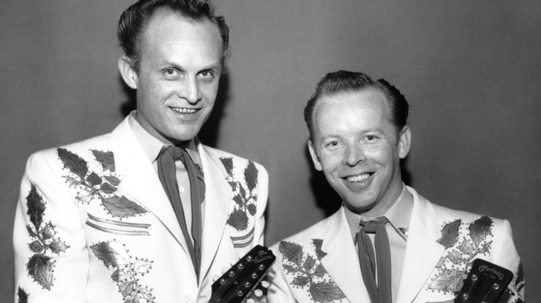 Louvin Brothers smiling in matching suits