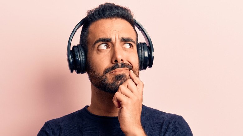 Headphones confused face