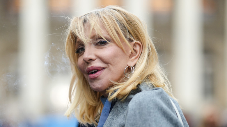 Courtney Love in grey coat