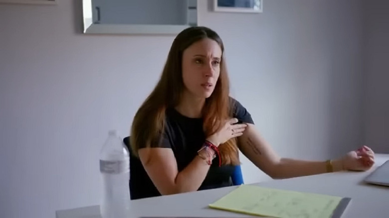 Casey Anthony showing tattoo