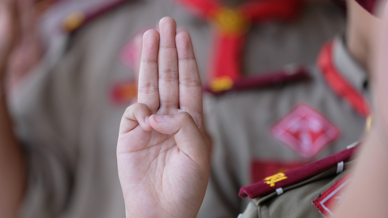 boy scout raised hand