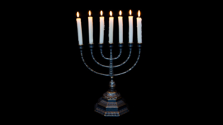 Lit menorah with seven candles