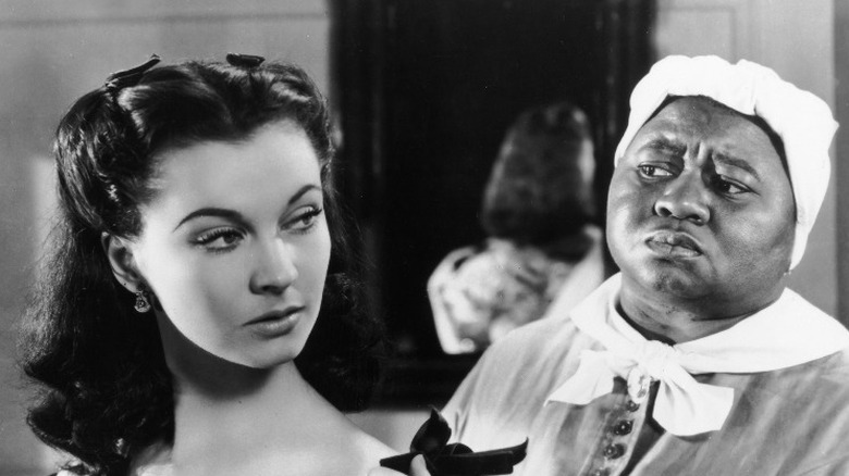Hattie McDaniel looks skeptical at Vivien Leigh
