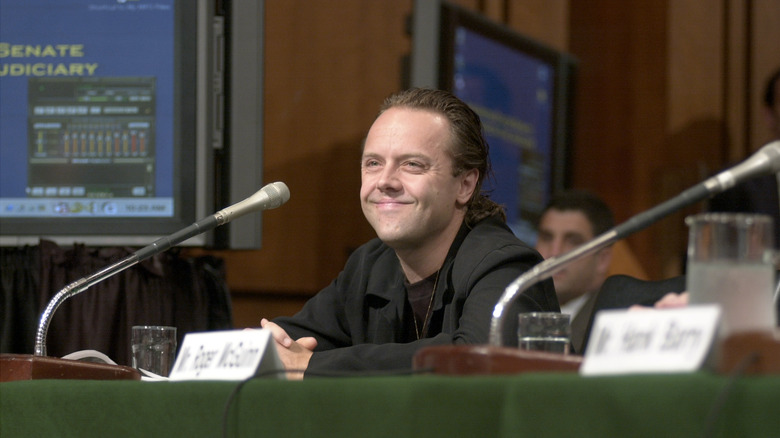 Lars Ulrich smiling in courtroom