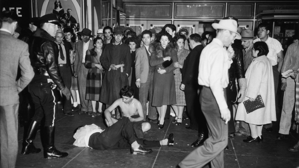 Two victims, one stripped, one badly beaten, of a gang of servicemen at a cinema in Los Angeles, California, during the Zoot Suit Riots, 7th June 1943. 