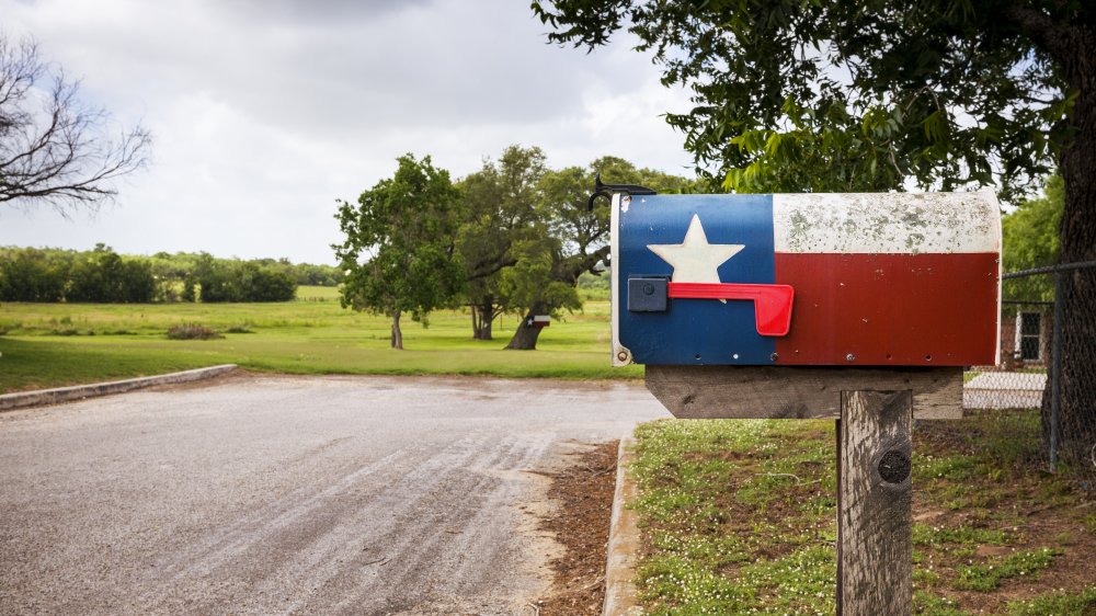 Mailbox painted with the Texas Flag in a street in Texas, USA