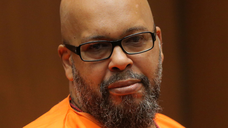 Suge Knight in court wearing glasses