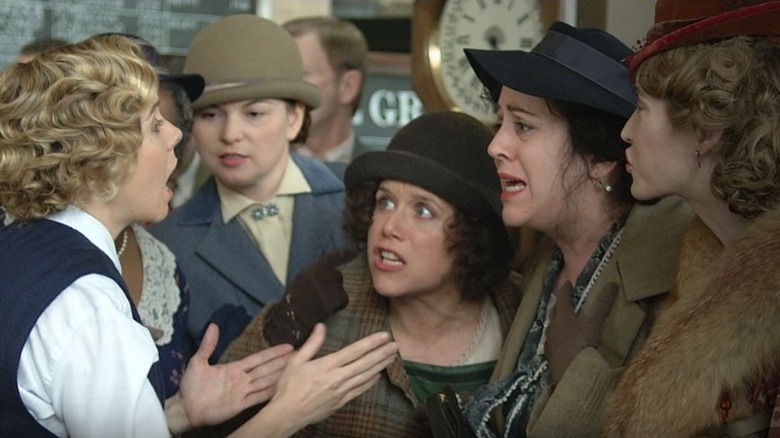 group of ladies yelling in movie