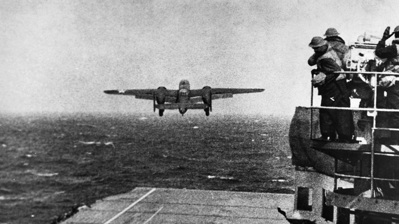 a bomber takes off from the deck of the USS Hornet for the Doolittle Raid