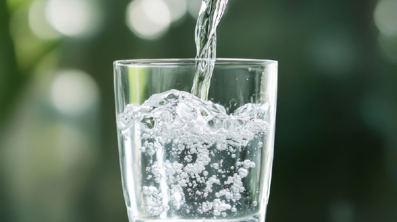 Water being poured into a glass