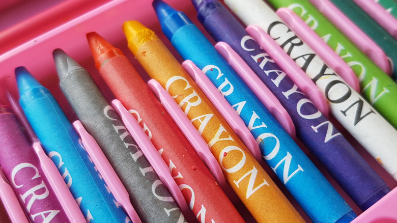 A pink box of crayons