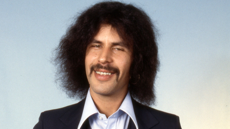 Randy California grinning with heavy eyes
