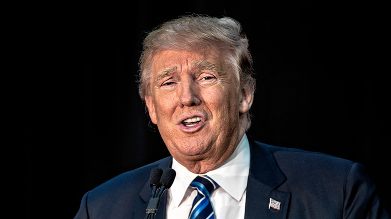 Donald Trump at a lectern