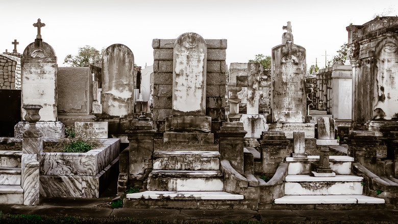 An old cemetery with damp tombstones