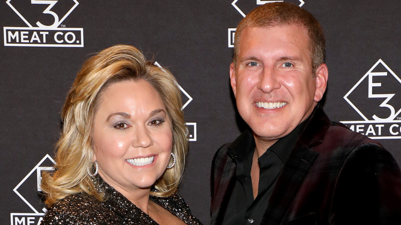 Julie and Todd Chrisley grinning