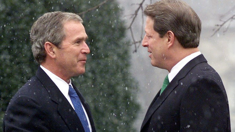 Bush and Gore shaking hands