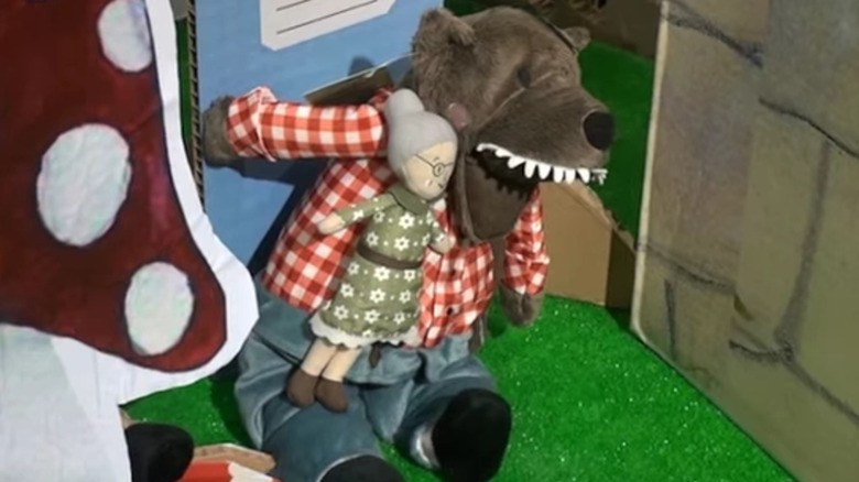 screenshot from newscast about the toy showing lusfig and grandmother dolls