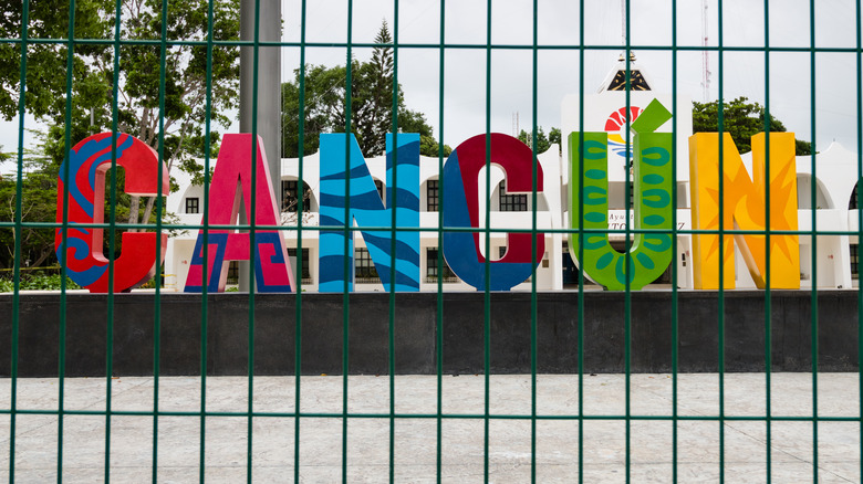 Cancun sign Benito Juarez