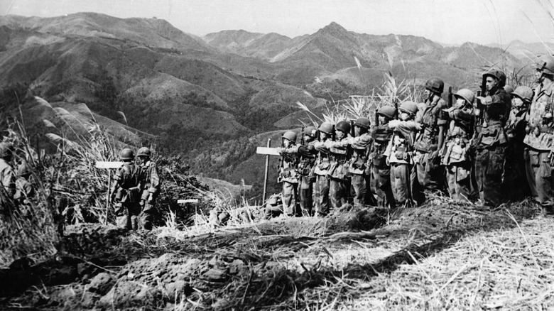 vietnamese allies of french forces report for orders at dien bien phu