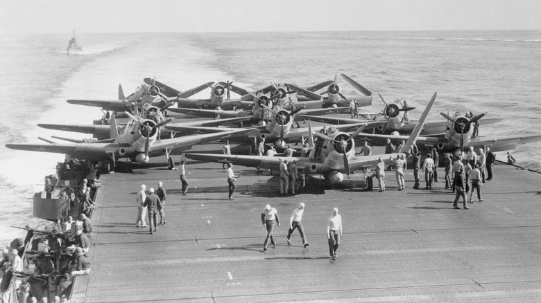 american bombers prepare to lift off from a carrier during the battle of midway