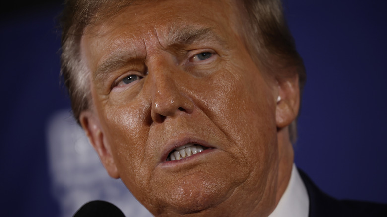 Donald Trump looking grim gritting his teeth