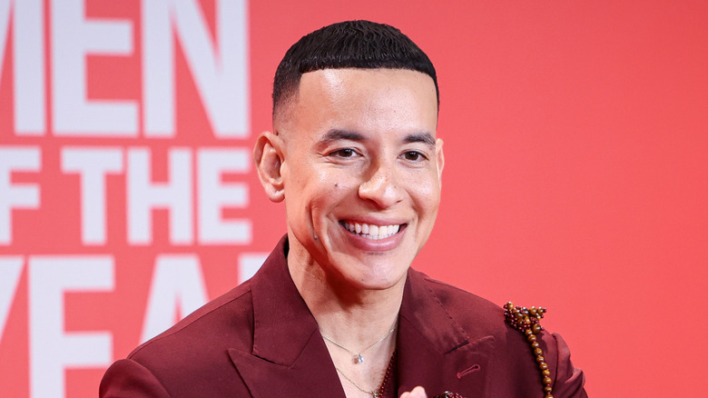 Daddy Yankee grinning