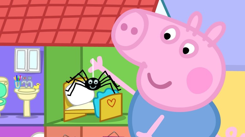Peppa Pig playing with a smiling spider