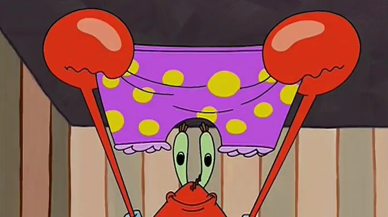 Mr. Krabs smiling holding up a pair of panties