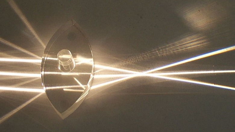 A glass lens bending light