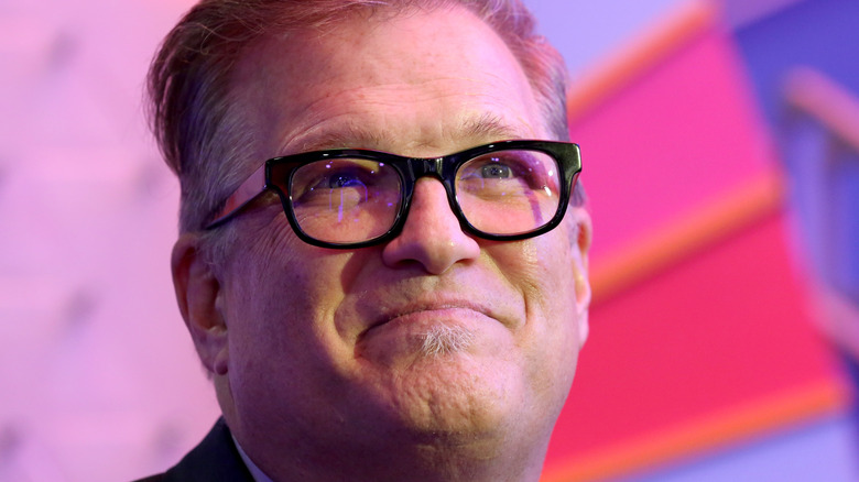 Drew Carey looking upwards