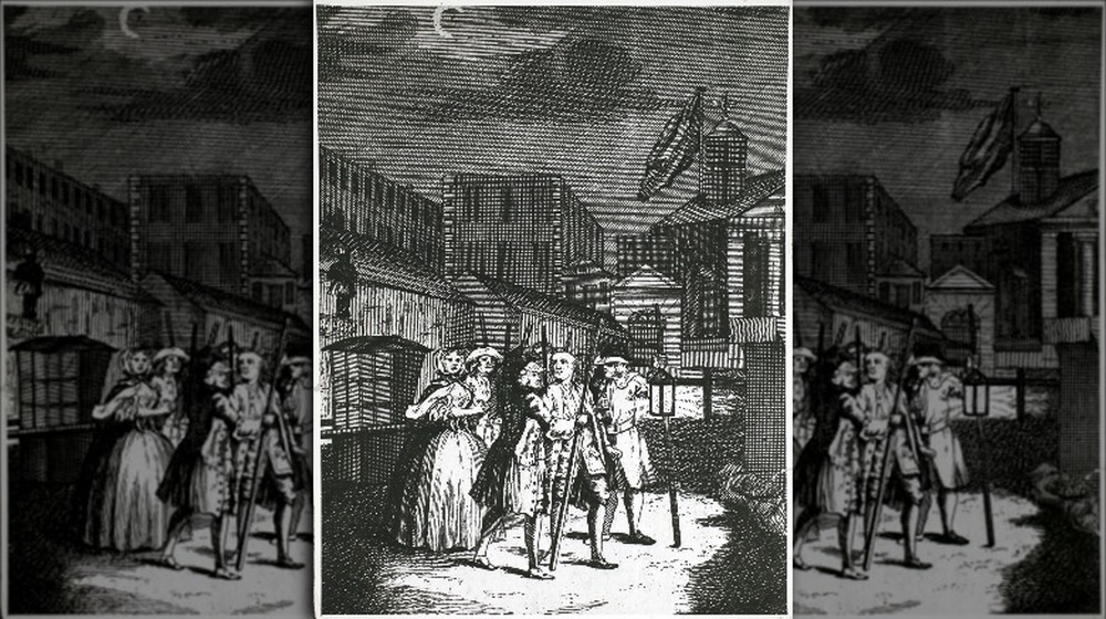 A highwayman being apprehended at night