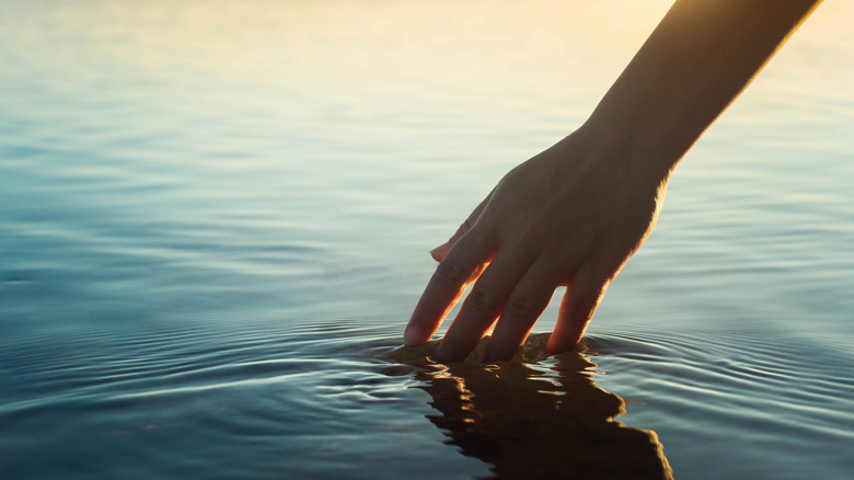 Hand in water