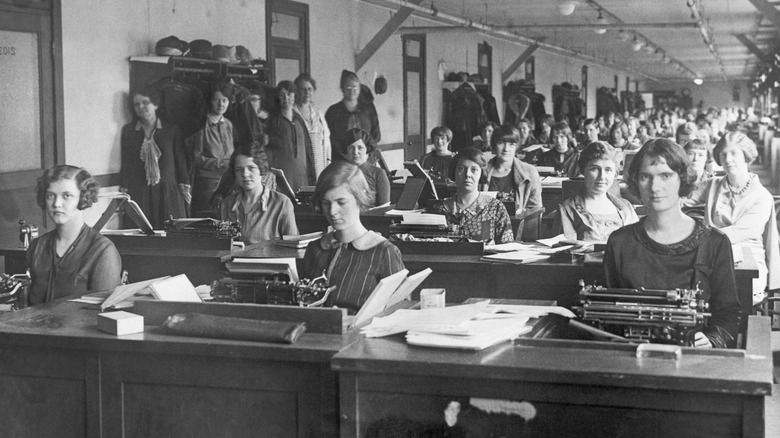 Women sat in front of typewriters