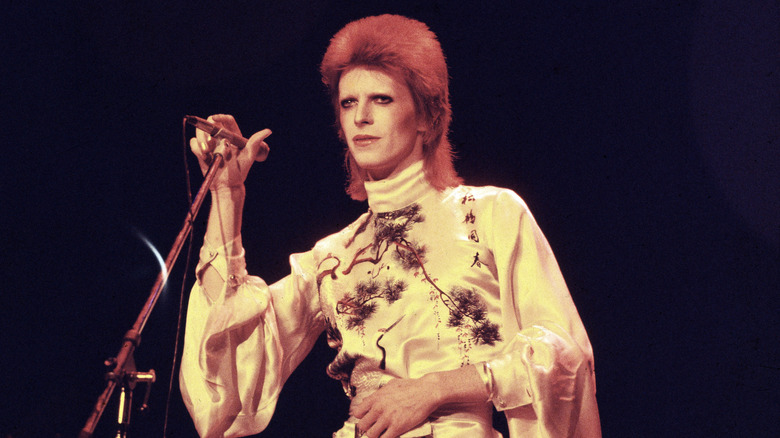 David Bowie singing orange hair silk costume