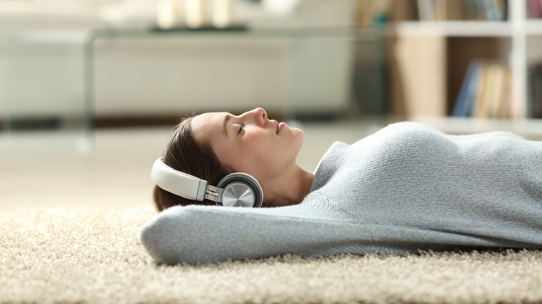 person listening to music