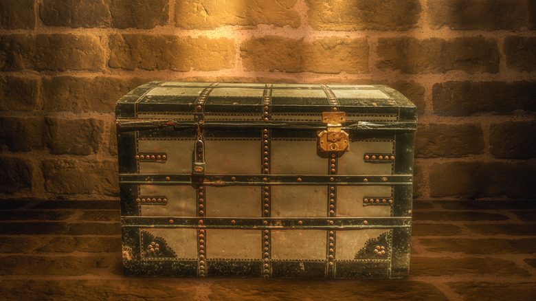 Large locked chest brick background